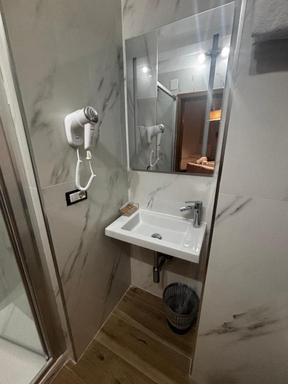 Koupelna v ubytování Hotel Gabriella