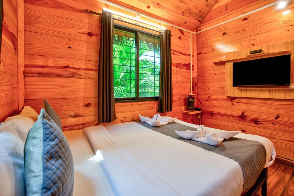 TV a/nebo společenská místnost v ubytování The Lazy Cabanas