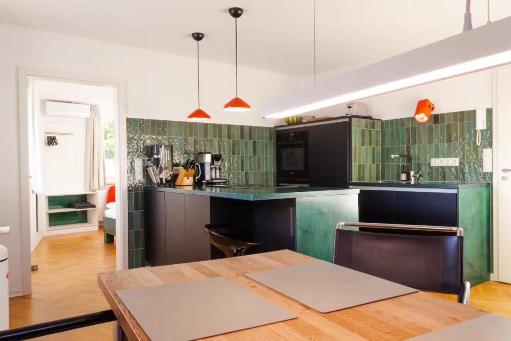 Kuchyň nebo kuchyňský kout v ubytování Klimatisierte Wohnung mit großer Terrasse