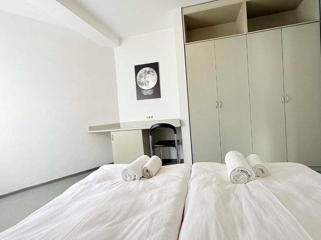 Postel nebo postele na pokoji v ubytování Hostel POINT