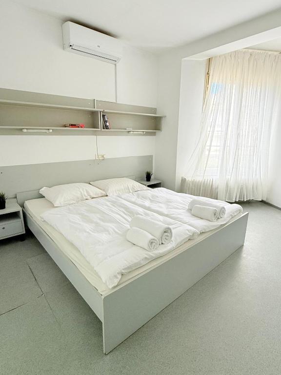 Postel nebo postele na pokoji v ubytování Hostel POINT