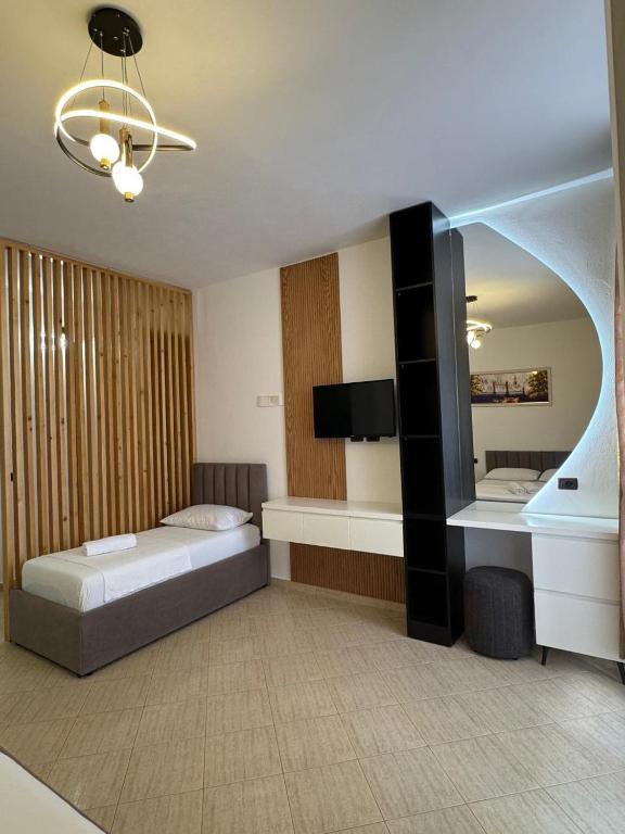 Postel nebo postele na pokoji v ubytování Eden Hotel