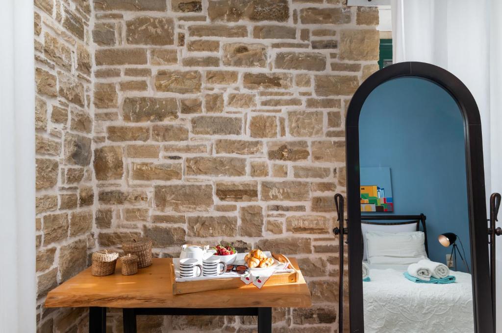 Postel nebo postele na pokoji v ubytování Carob Villa
