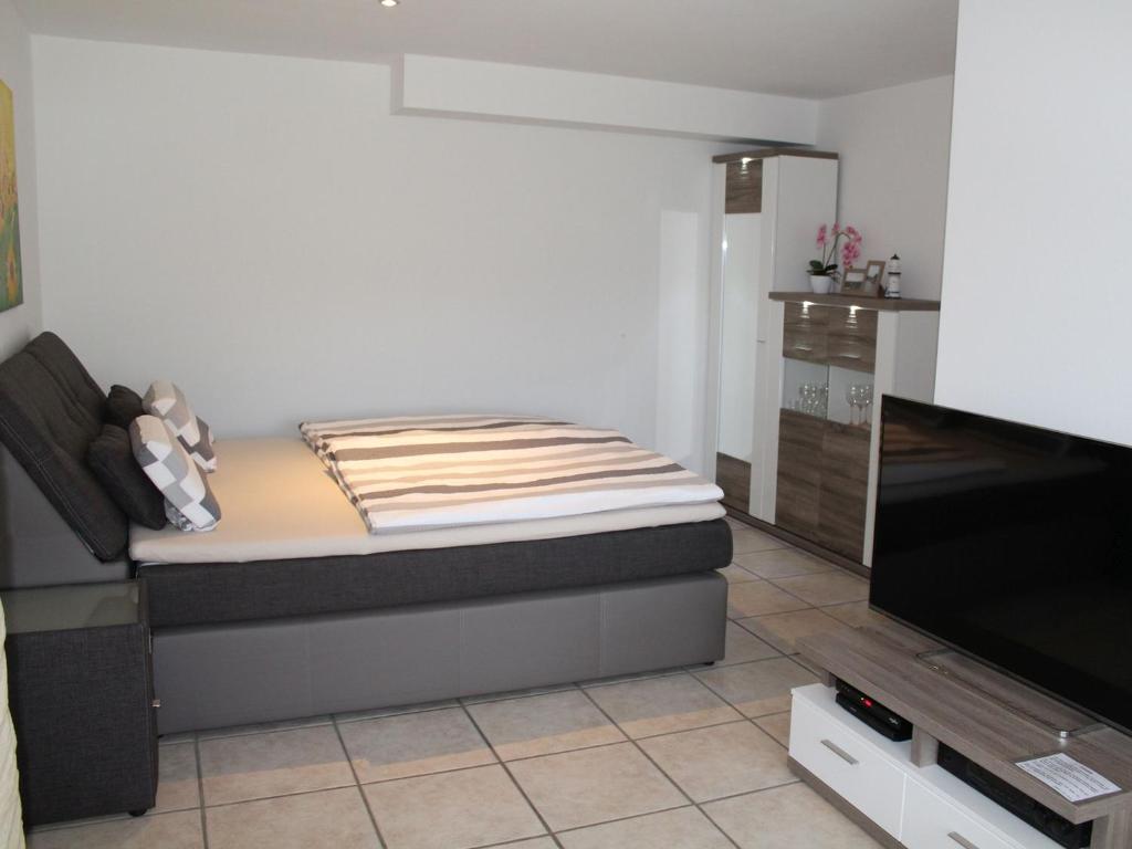 Postel nebo postele na pokoji v ubytování Ferienwohnung Am Fischteich