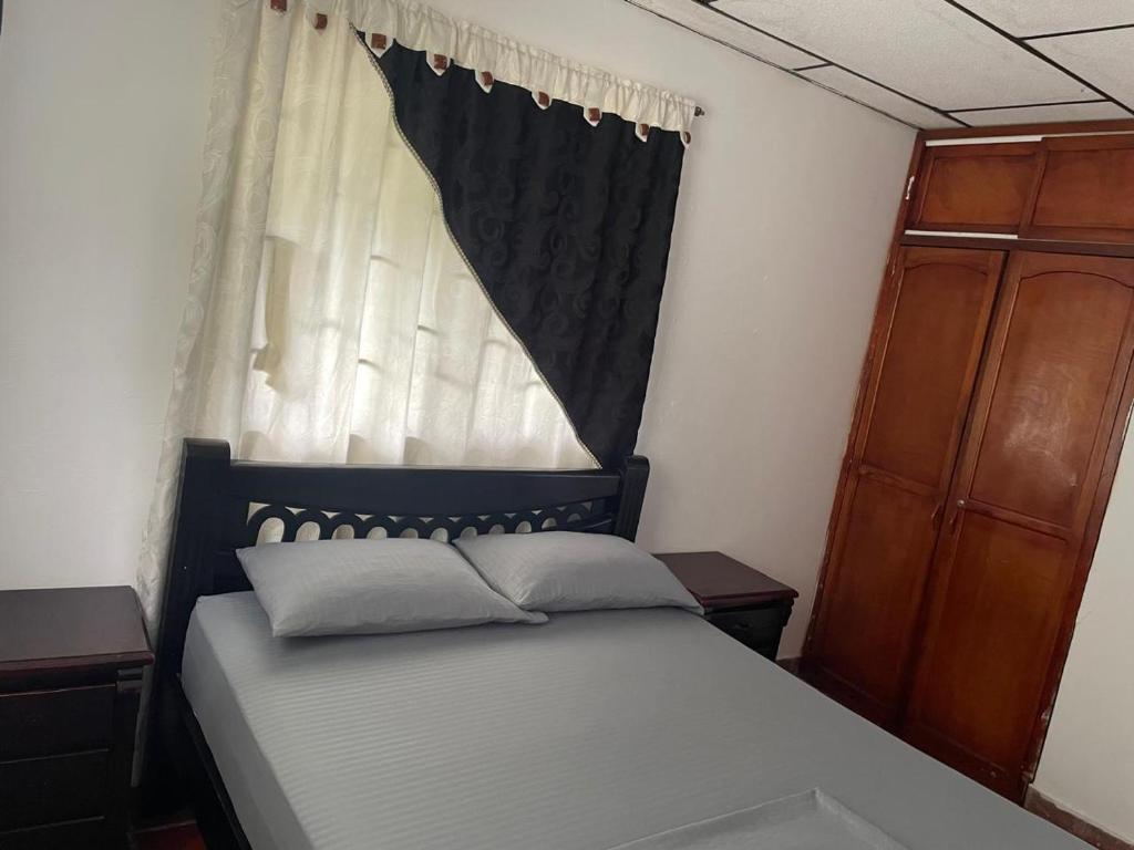 Postel nebo postele na pokoji v ubytování Apartamentos Poseidon