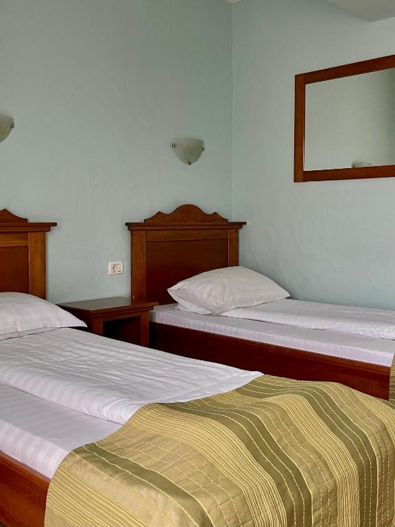Postel nebo postele na pokoji v ubytování Hotel Lucy Star