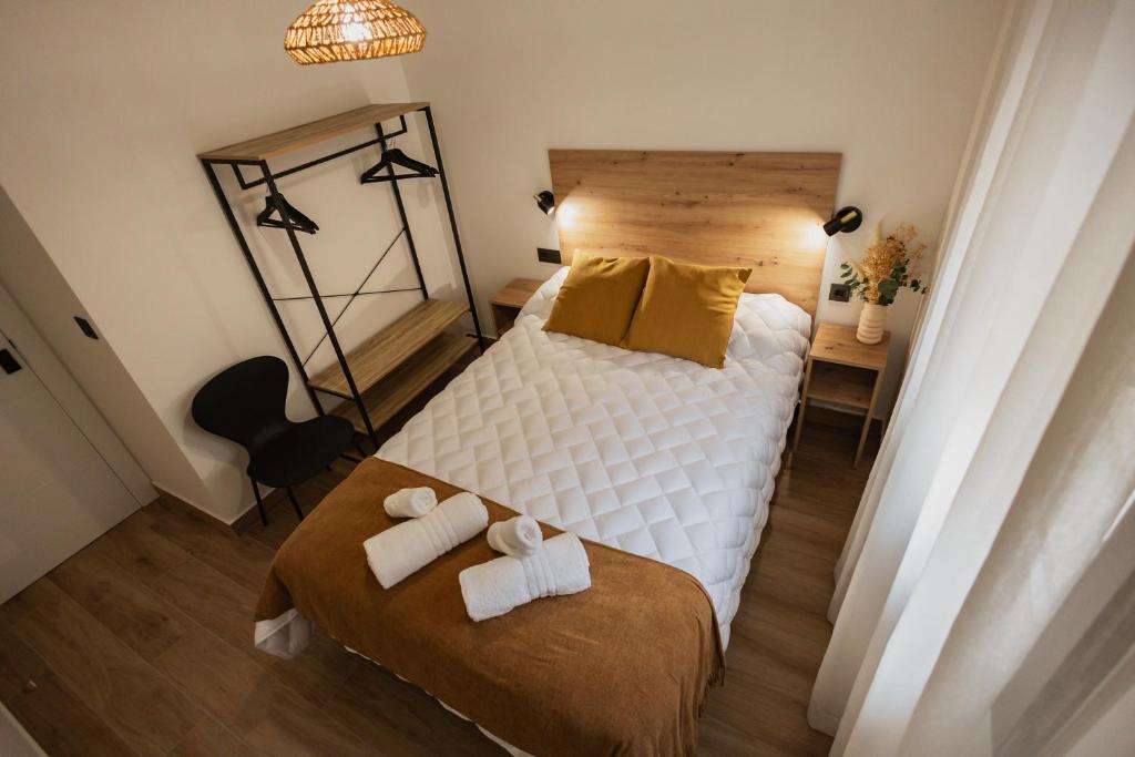Postel nebo postele na pokoji v ubytování Mar de Olivos Baeza
