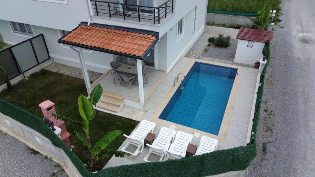 an overhead view of a house with a swimming pool at Lavender Villas in Dalaman