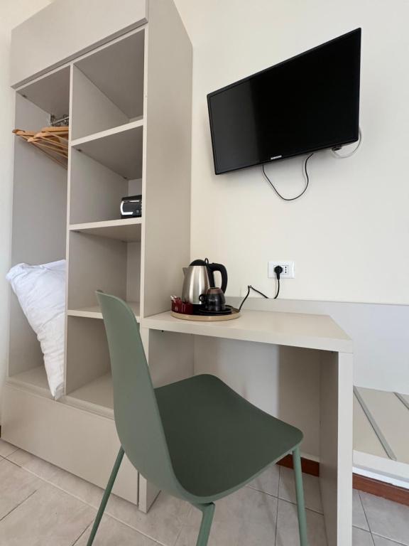 TV a/nebo společenská místnost v ubytování Hotel e Ristorante Cassone