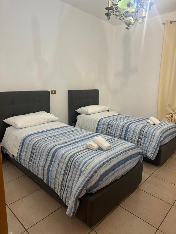 Postel nebo postele na pokoji v ubytování Seldas House
