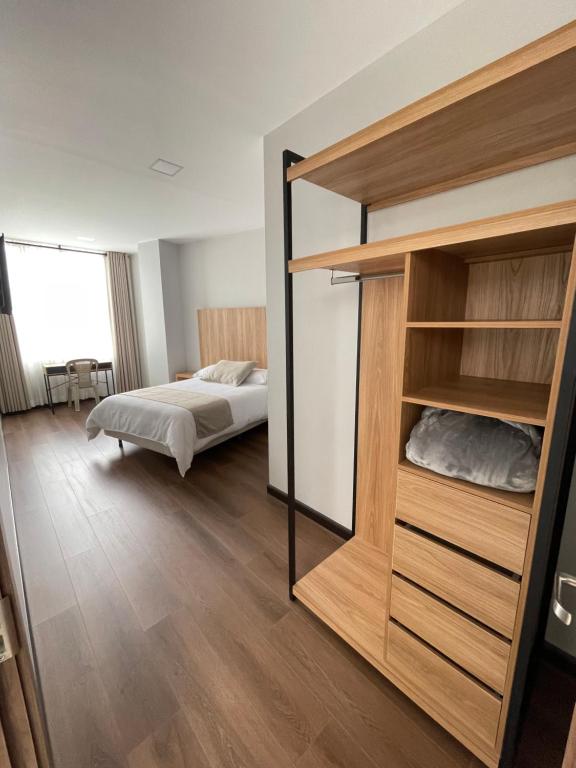Postel nebo postele na pokoji v ubytování Universitario Hotel