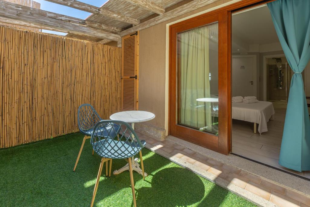 Postel nebo postele na pokoji v ubytování Domu Ajaju Guest House