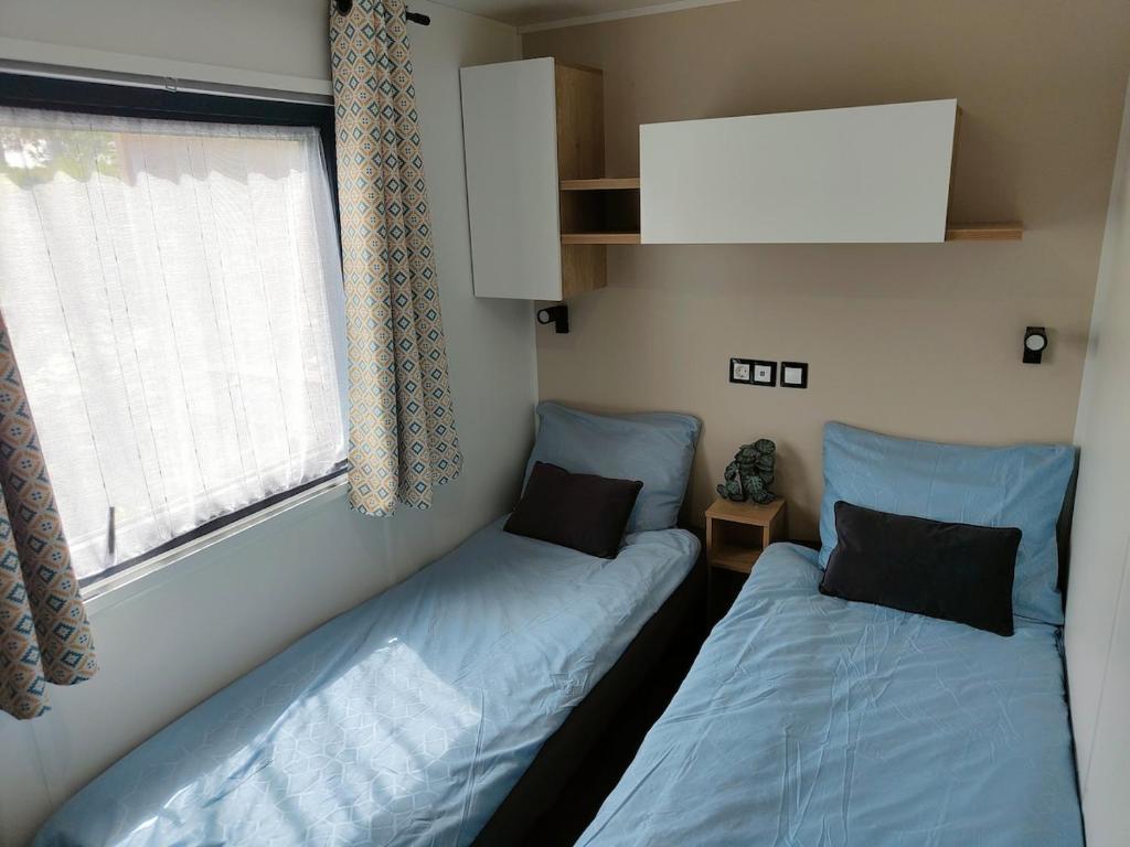 Postel nebo postele na pokoji v ubytování Casa Gera Lauwersoog