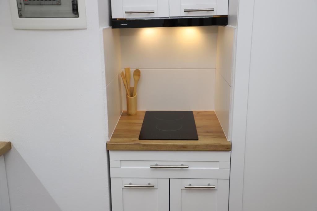 Kuchyň nebo kuchyňský kout v ubytování Central Apartment Berat