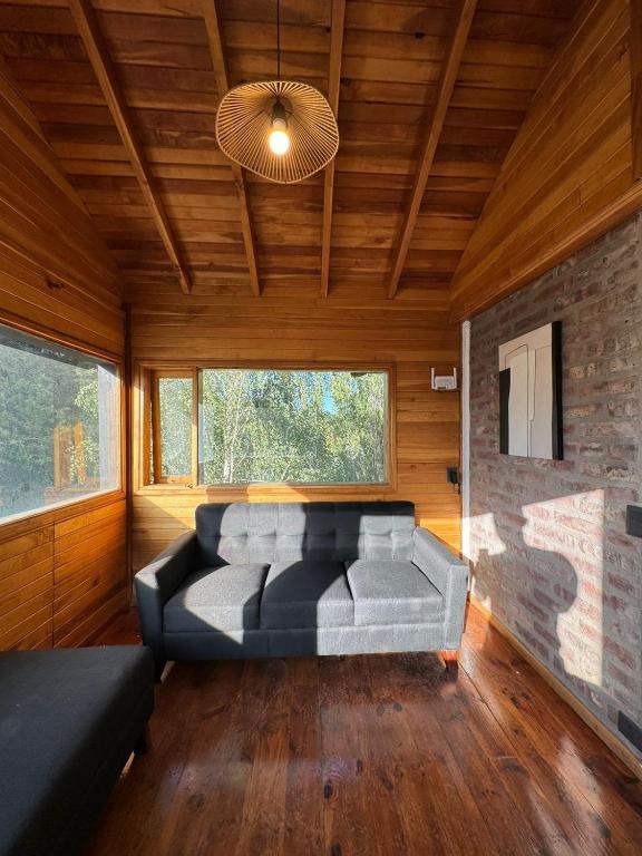 Postel nebo postele na pokoji v ubytování Cabañas La Cascada Huilen