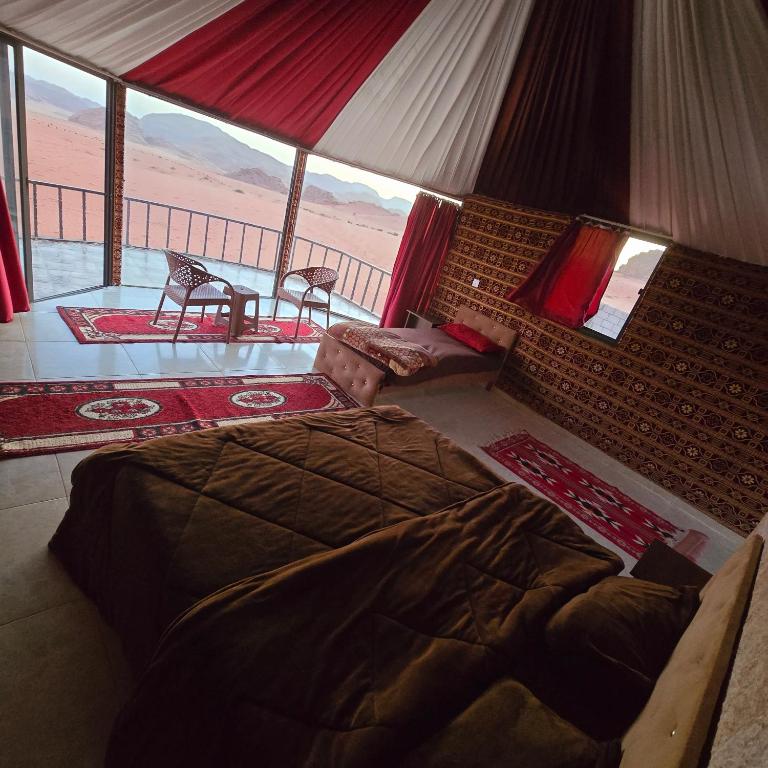 Letto o letti in una camera di Wadi Rum Candles Camp