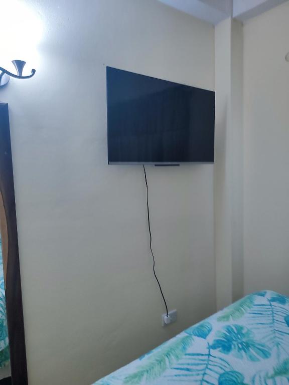 TV a/nebo společenská místnost v ubytování Belle Cove