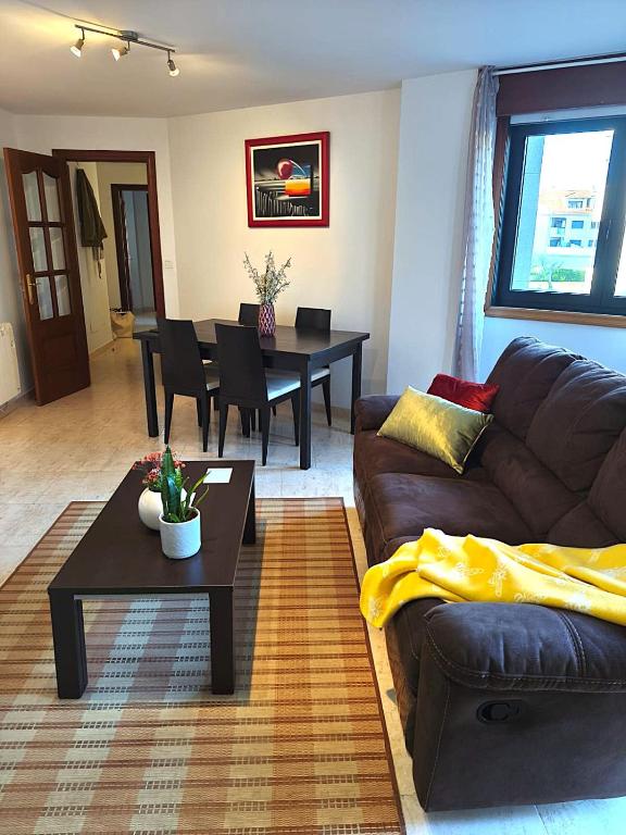 Posezení v ubytování Holibai Orballo Apto funcional y económico para una estancia low cost