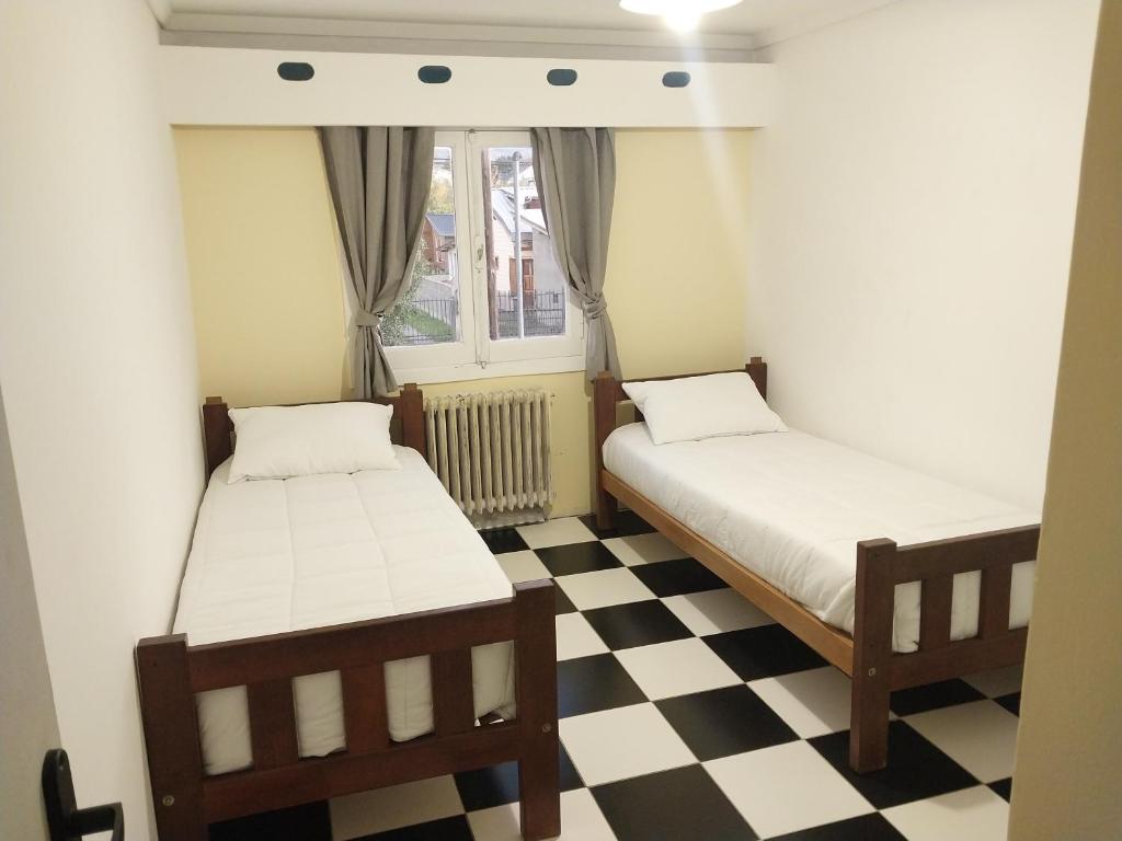 Postel nebo postele na pokoji v ubytování Casa central hostel
