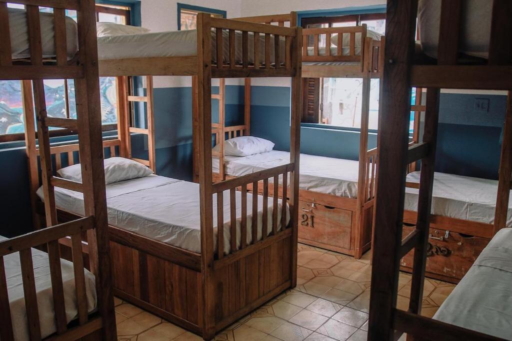 Postel nebo postele na pokoji v ubytování santo hostel parati