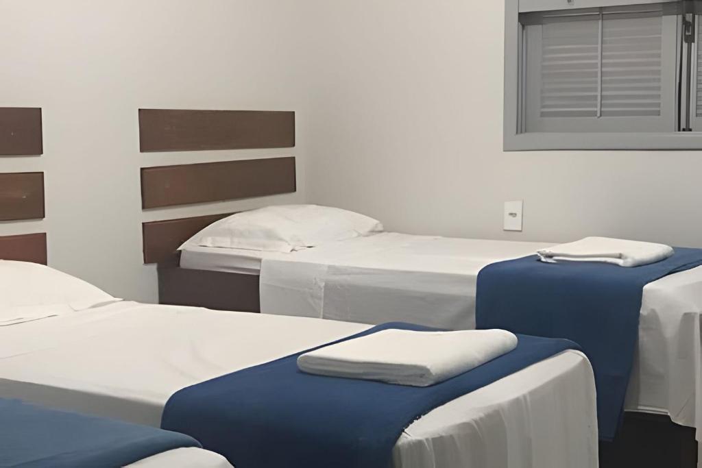Ένα ή περισσότερα κρεβάτια σε δωμάτιο στο 4let Saint Jhon Peró