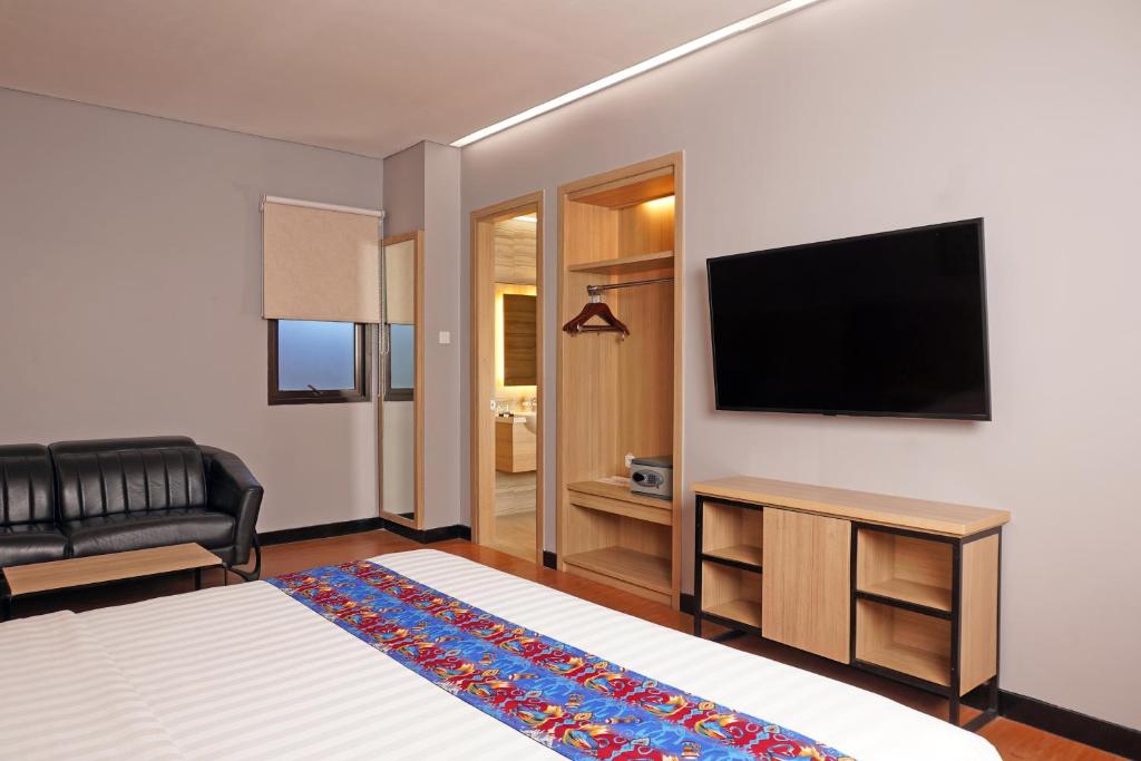 TV a/nebo společenská místnost v ubytování Best Western Sagita Hotel Jayapura