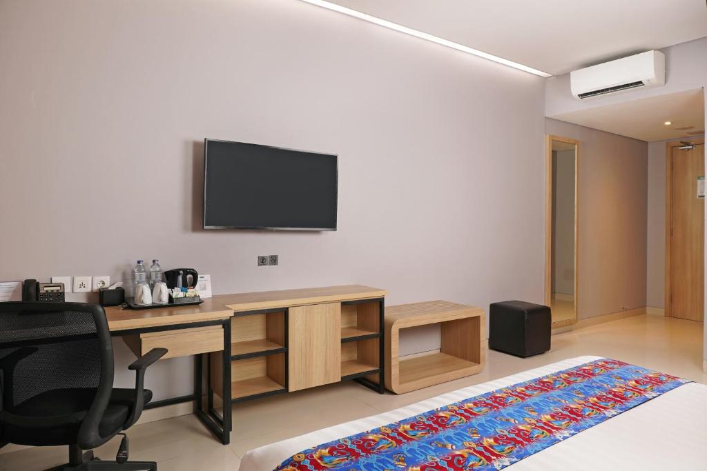 TV a/nebo společenská místnost v ubytování Best Western Sagita Hotel Jayapura