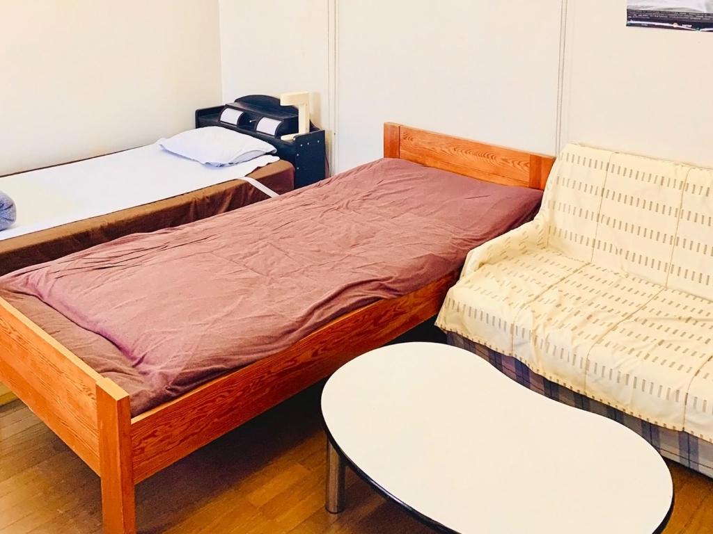 Postel nebo postele na pokoji v ubytování Guesthouse IKETA