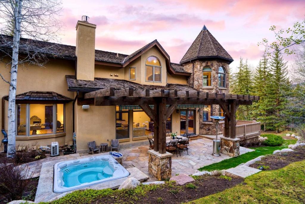 a house with a pool in the yard at Cozy Edwards Retreat w Fireplace Near Ski Resort Osprey Nest by AvantStay in Edwards