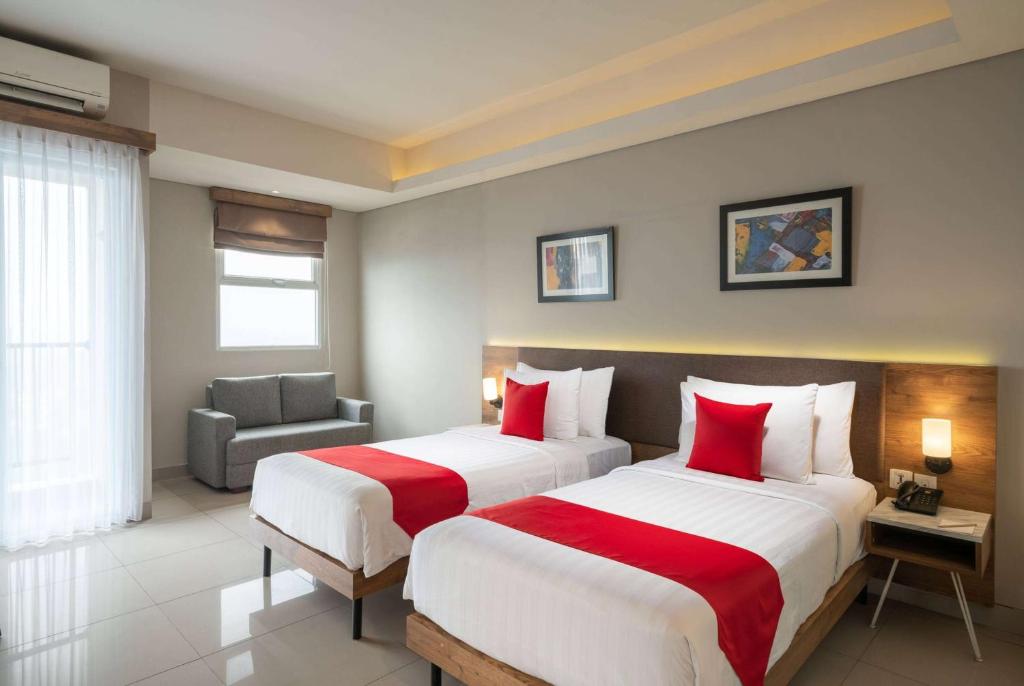 Letto o letti in una camera di Ramada by Wyndham Serpong