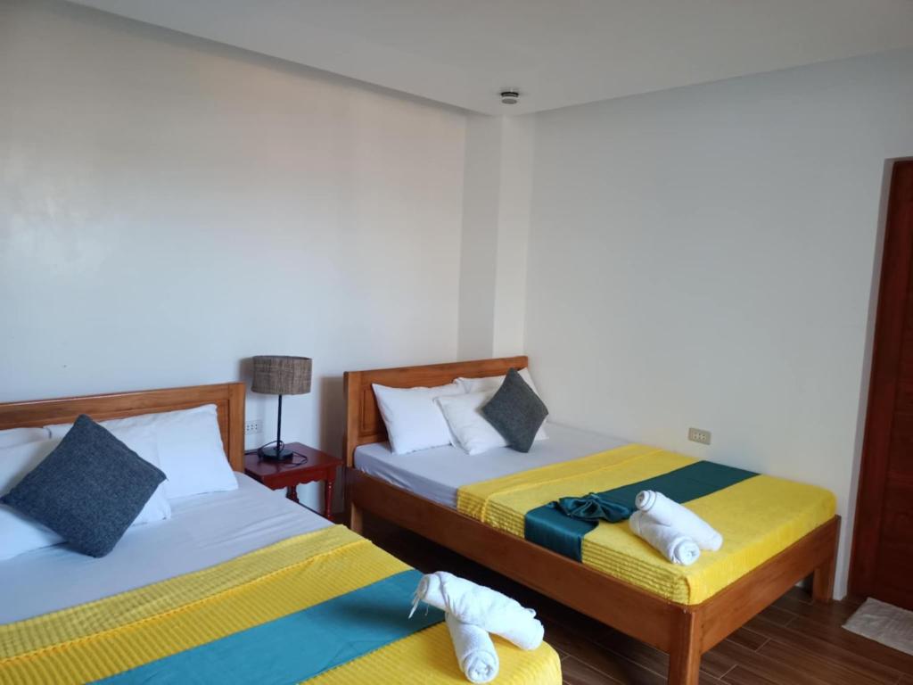 Postel nebo postele na pokoji v ubytování Casita Lodge