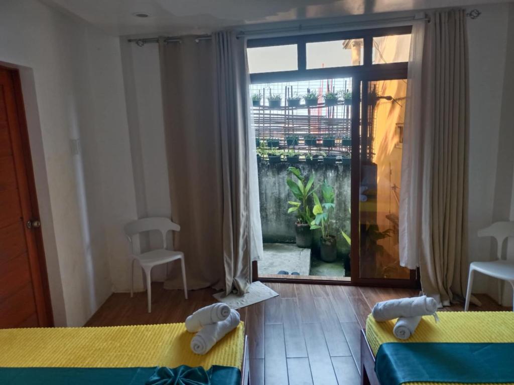 Postel nebo postele na pokoji v ubytování Casita Lodge