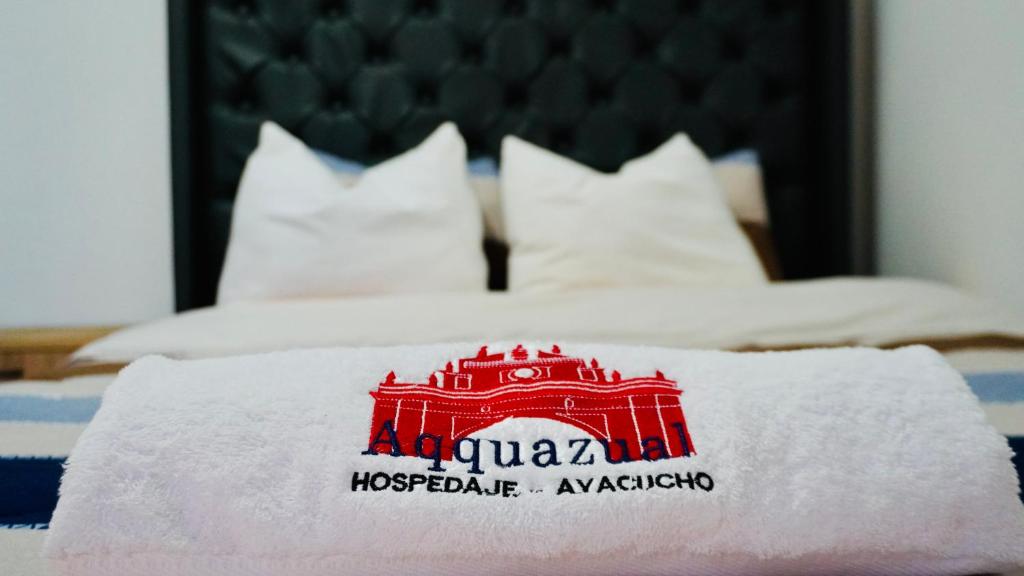 Postel nebo postele na pokoji v ubytování Hospedaje Aqquazul Ayacucho