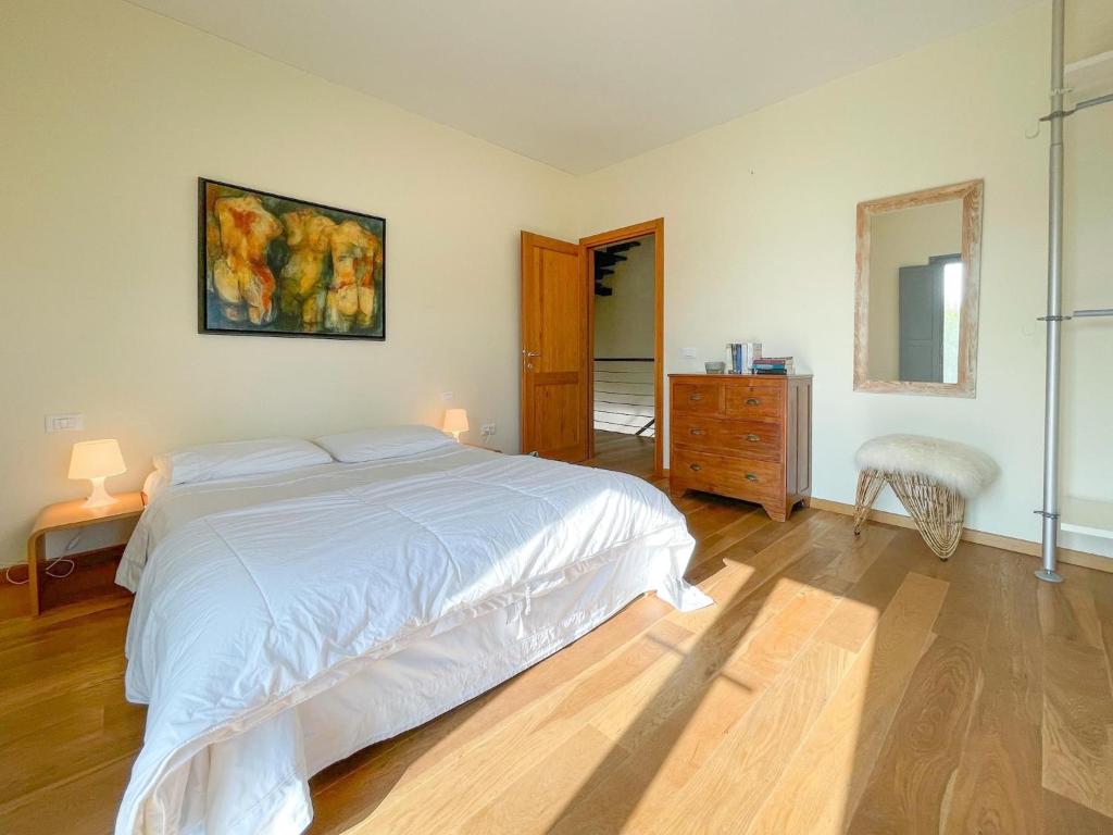 Posteľ alebo postele v izbe v ubytovaní Amazing apartment in Belvedere Ostrense with garden