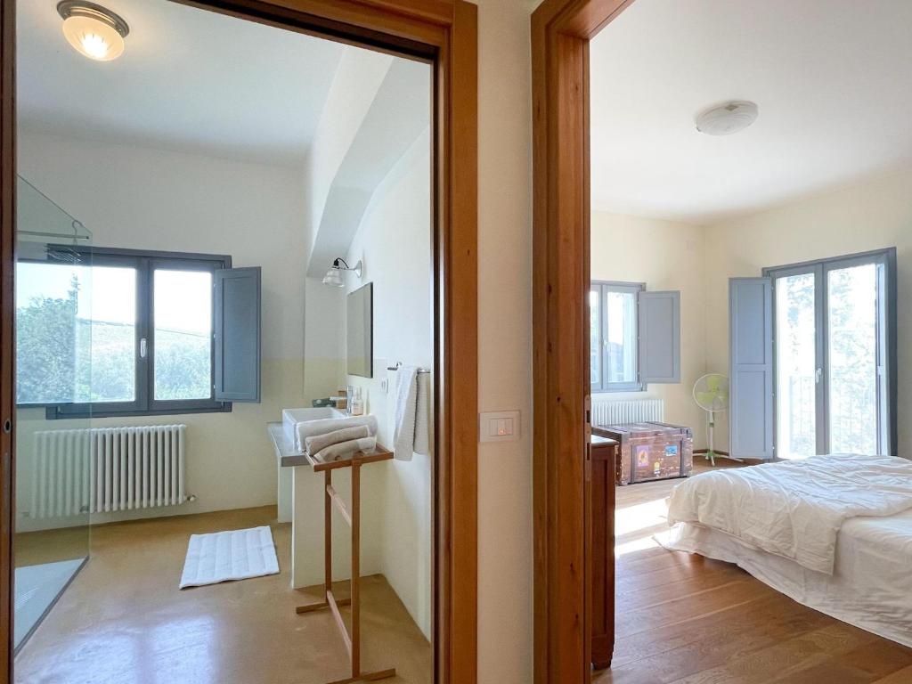 Posteľ alebo postele v izbe v ubytovaní Amazing apartment in Belvedere Ostrense with garden