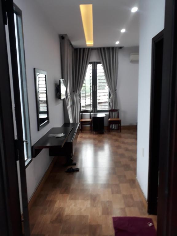 Postel nebo postele na pokoji v ubytování Nhà Nghỉ Việt Thương