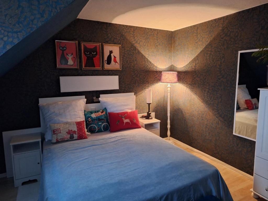 Postel nebo postele na pokoji v ubytování WOB Hotel