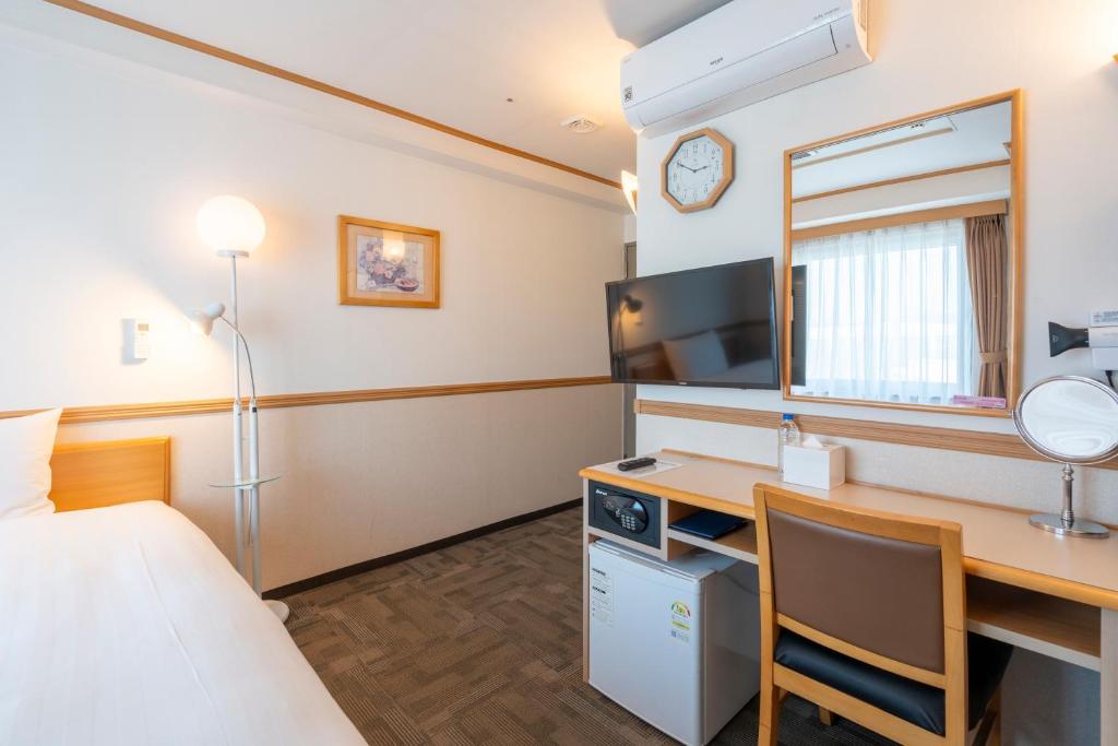 TV a/nebo společenská místnost v ubytování Toyoko Inn Daejeon Government Complex