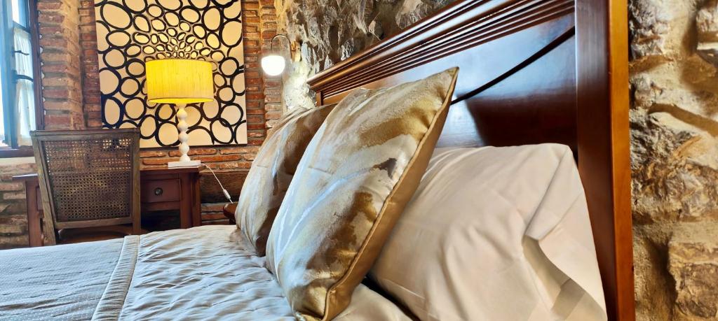 A bed or beds in a room at El Juacu