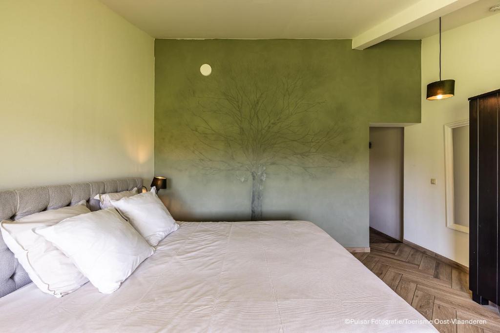 Postel nebo postele na pokoji v ubytování Op 't Roth 12 ruime sfeervolle vakantiewoning in 't groen
