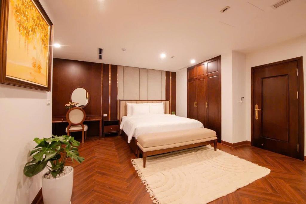 Ένα ή περισσότερα κρεβάτια σε δωμάτιο στο Lake Side Lodge Panorama View - Nhật Chiêu, Hồ Tây