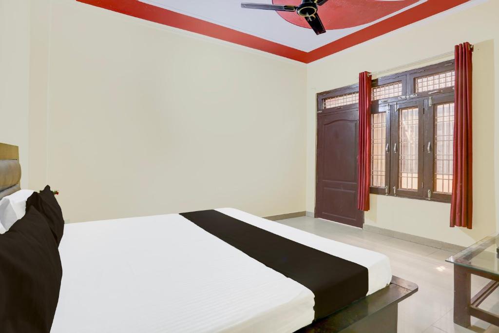 Postel nebo postele na pokoji v ubytování Hotel O NKA