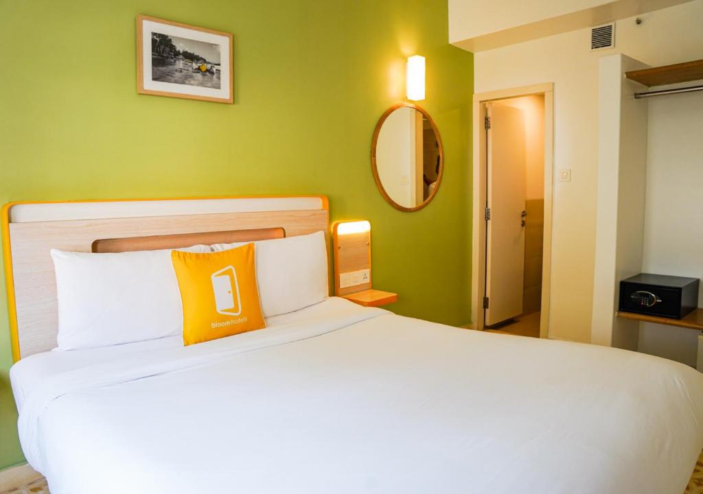 Postel nebo postele na pokoji v ubytování Bloom Hotel - Calangute