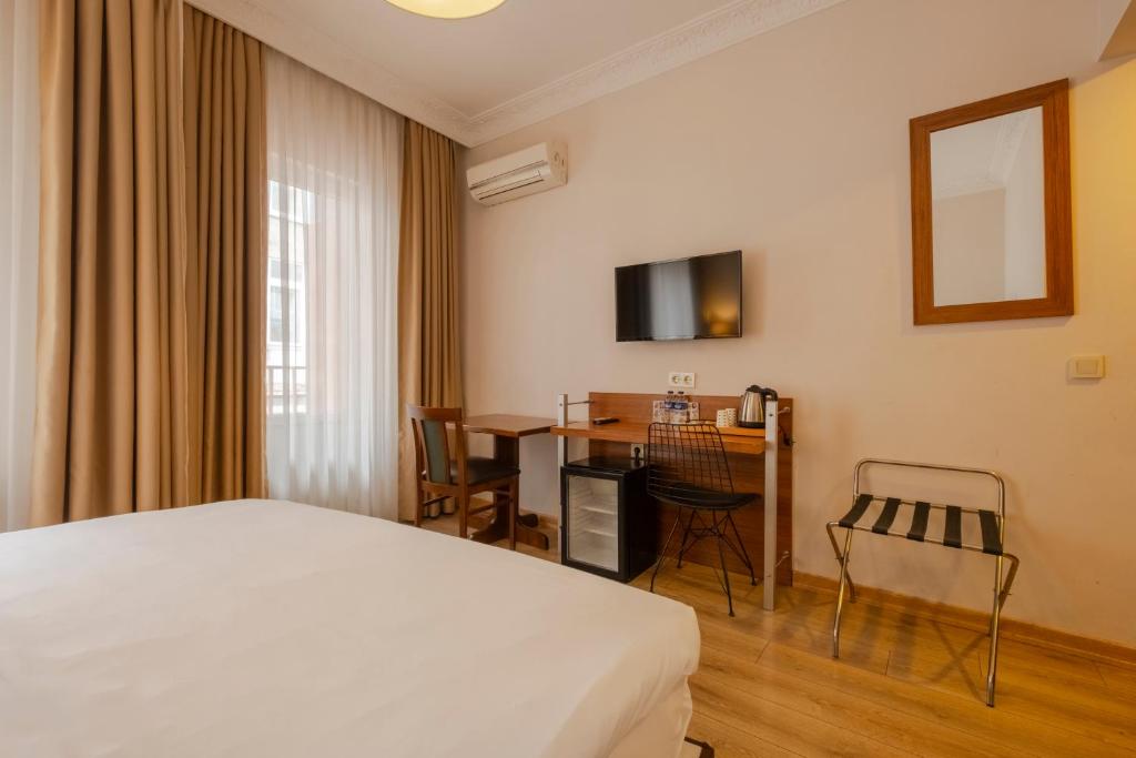 TV a/nebo společenská místnost v ubytování Sisli MLS Hotel