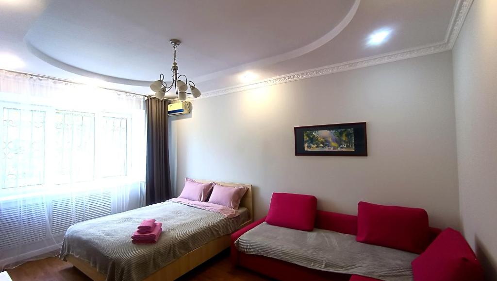 تصویر اتاق‌های Cozy apartment near Alatau metro station - تصویر ۲