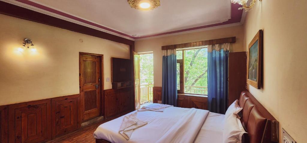 Postel nebo postele na pokoji v ubytování Hostelam The Mountain Story