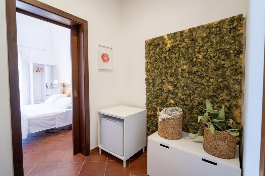 Postel nebo postele na pokoji v ubytování Casa Scala