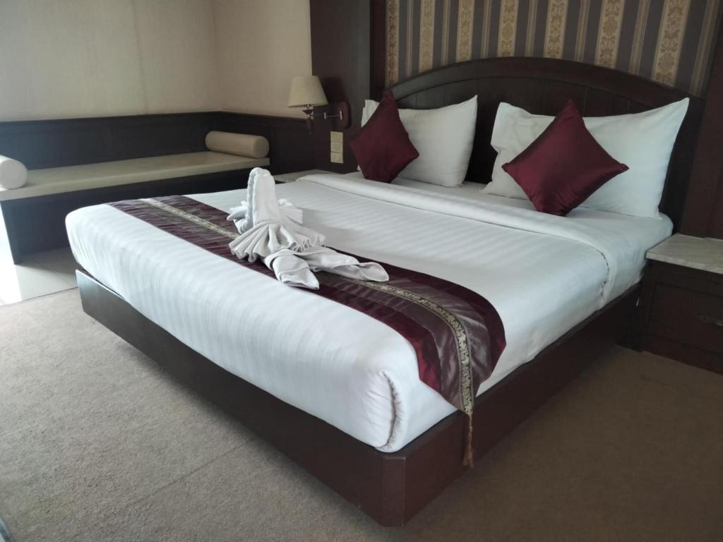 Cama o camas de una habitación en The Lion King Hotel Udonthani
