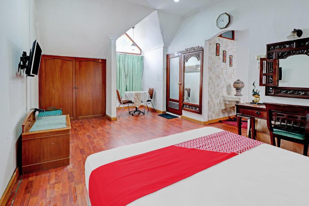 Voodi või voodid majutusasutuse Hotel O Bandung near Stadion Siliwangi formerly The Ethnic Hotel Bandung toas