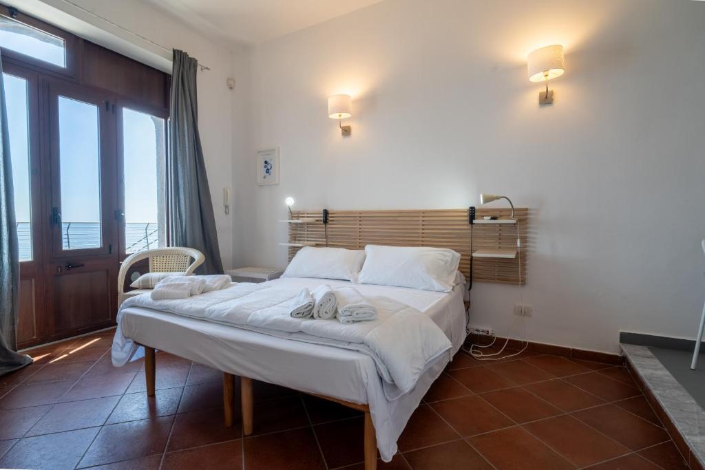 Postel nebo postele na pokoji v ubytování Casa Scala
